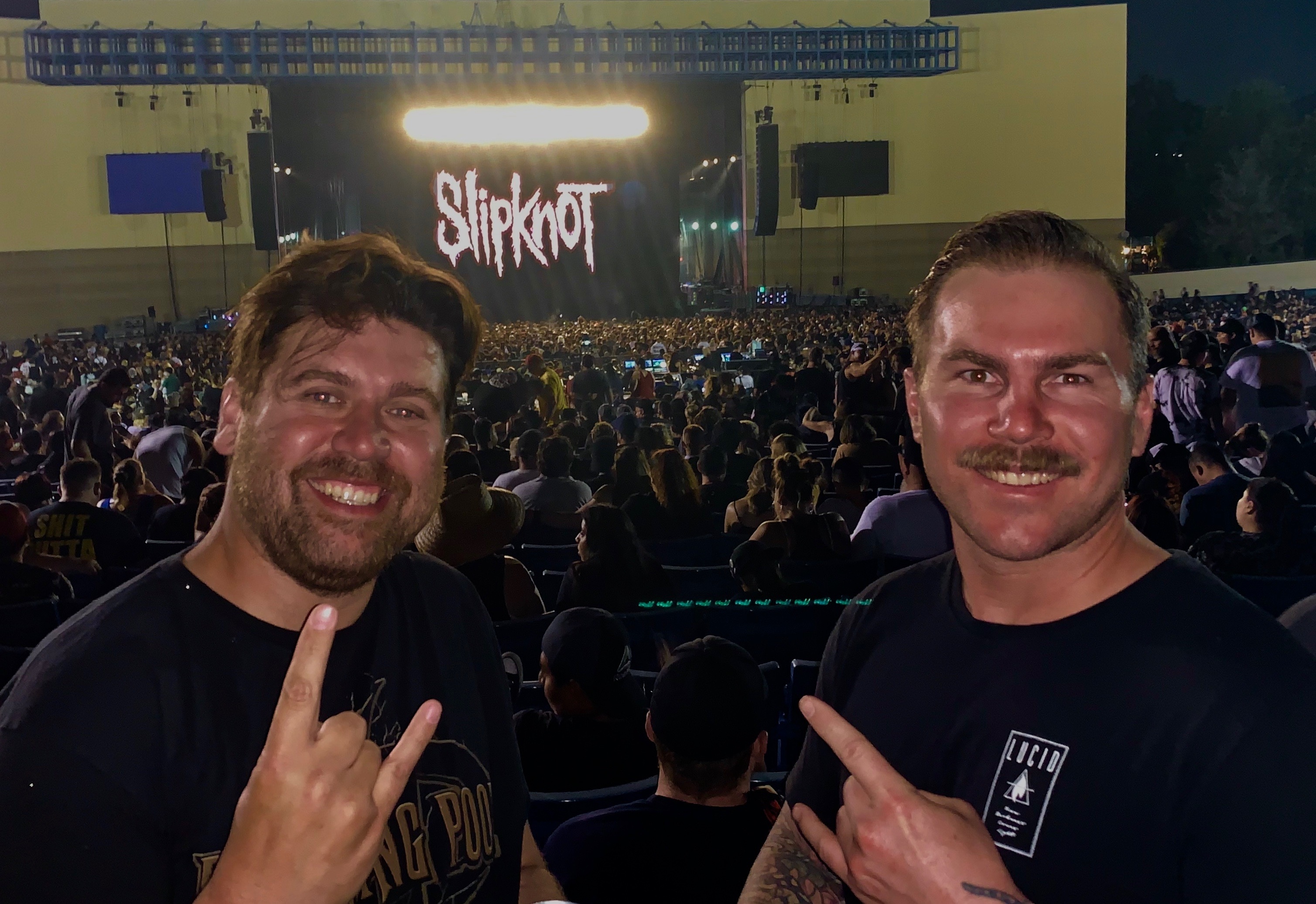 Ross McGibbon and his mate Dan at a Slipknot concert after a week of searching for reptiles in Arizona.